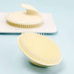 Brosse à shampoing massante pour le cuir chevelu