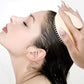 Brosse à shampoing massante pour le cuir chevelu
