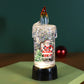 Bougie de Noël lumineuse à piles avec effet boule à neige