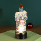 Bougie de Noël lumineuse à piles avec effet boule à neige
