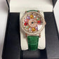 Montre à cadran rotatif pour femme avec diamants simulés colorés