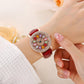 Montre à cadran rotatif pour femme avec diamants simulés colorés