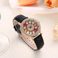 Montre à cadran rotatif pour femme avec diamants simulés colorés
